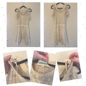 Gently Used - Size 2 - beautiful beige dress with embroidery and sequin detail.